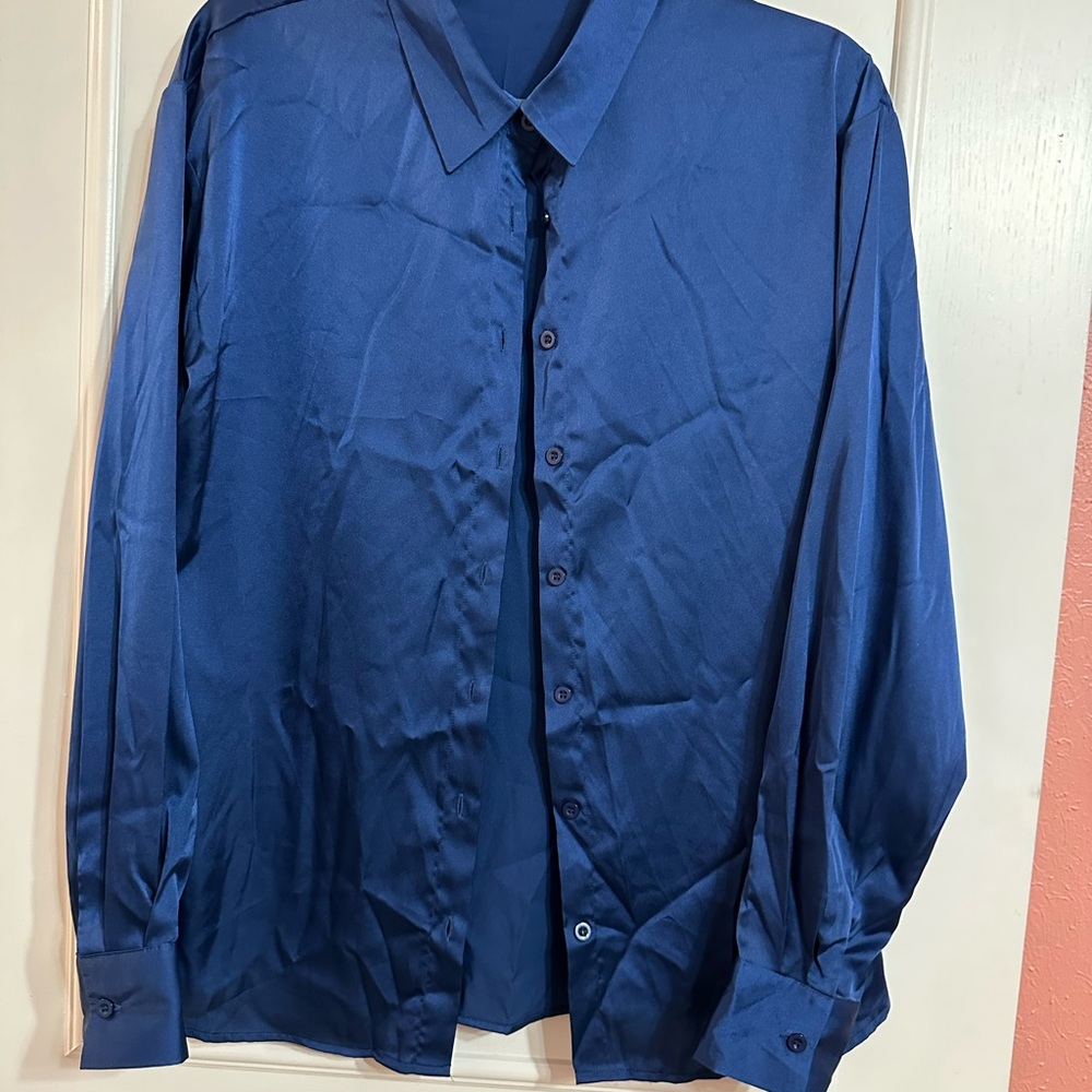 NWOT- Size L -Women’s Deep Blue Satiny Blouse. 100% Polyester